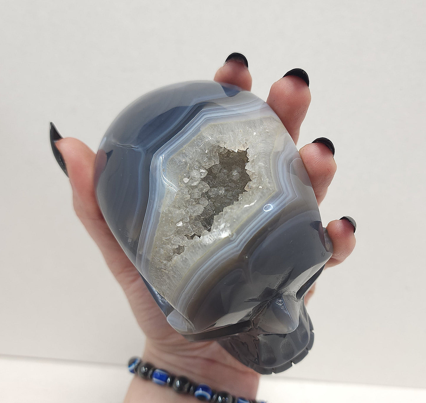 Banded Agate skull with Quartz Geode #1